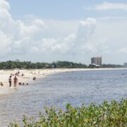 Beachgoers at Ken Combs Pier in Gulfport, MS