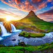 Gorgeous landscape with rising sun on Kirkjufellsfoss waterfall