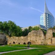 Ruins of Reading, UK backdropped by modern high-rise