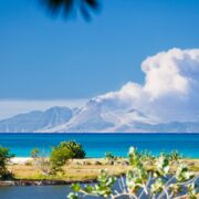 View to the active volcano in Montserrat with a large ash cloud.