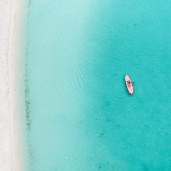 10 Beaches With the Clearest Water in the Caribbean, From Turks and Caicos to Aruba and the Cayman Islands